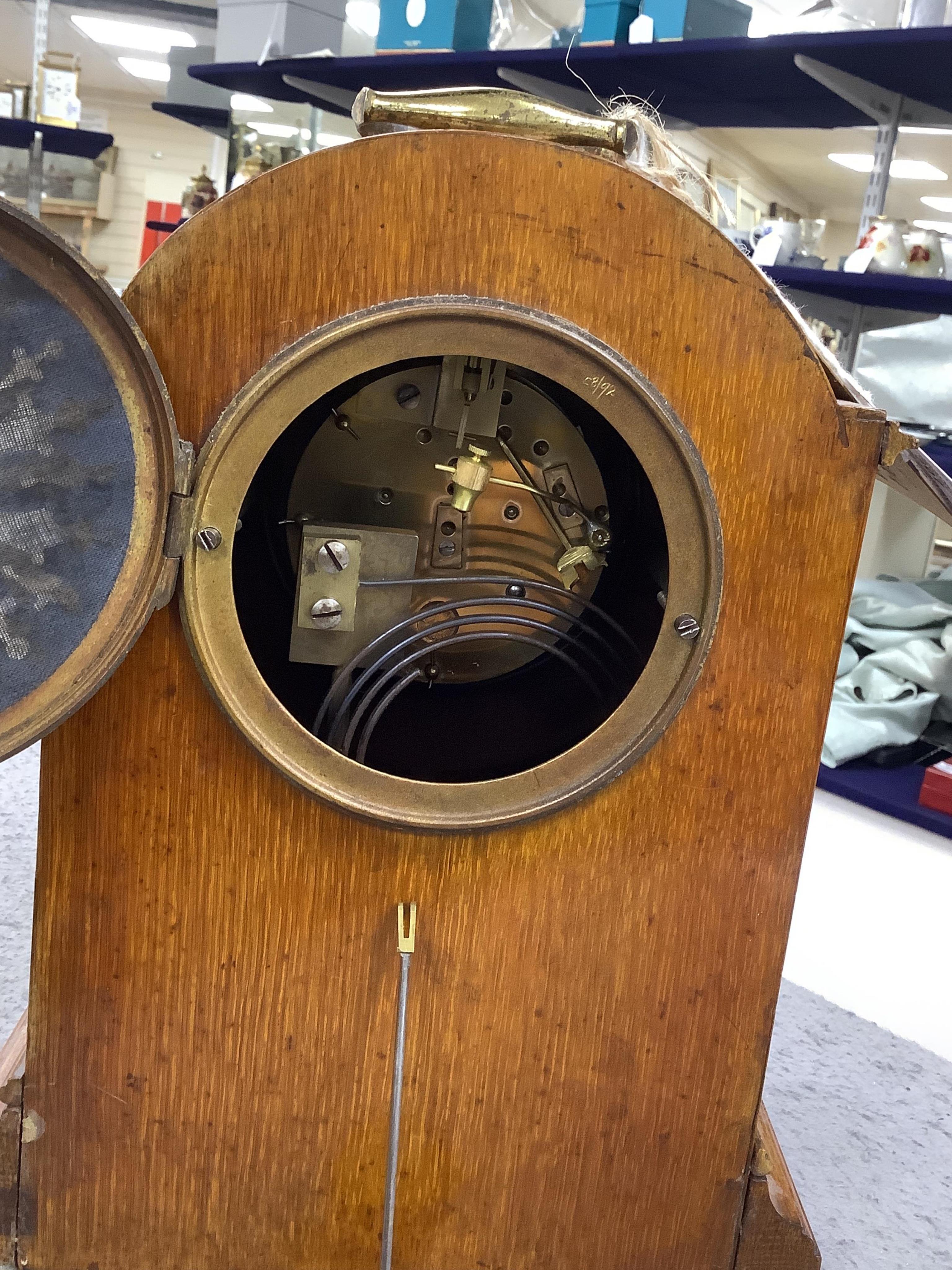 A 19th century mahogany eight day mantel clock with enamel dial and pendulum, 30cm high. Condition - fair, not tested